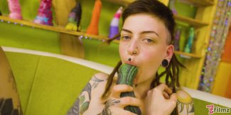 Skinny Inked Girl with Dreadlocks vs. The Toy Wall She's Covered, Everywhere