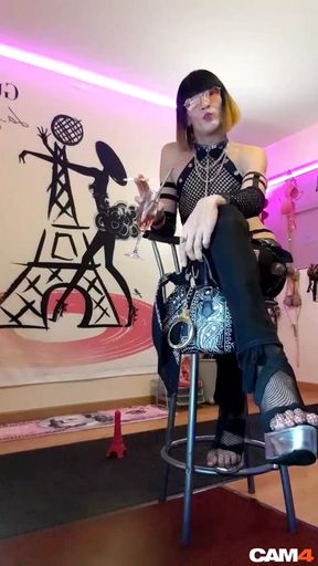 A French Shemale Bombshell Does a Live Striptease