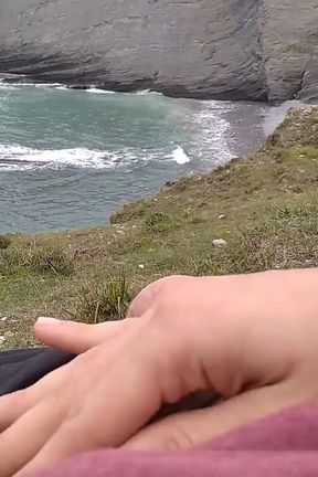 Big Beautiful Big Fat Cock Gets Handjob on the Beach with Gorgeous Sea Views