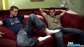 He gives his good buddy a nice foot wank and makes him cum