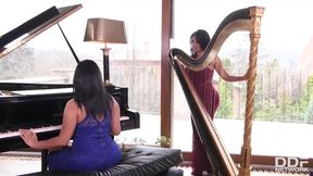 Kesha Ortega and Sheila Ortega are passionately making love with each other, in the piano room