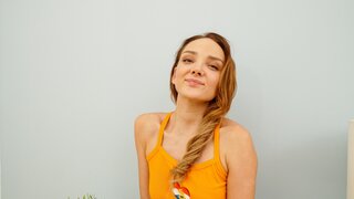 Hot starlet with natural boobs is playing with her twat