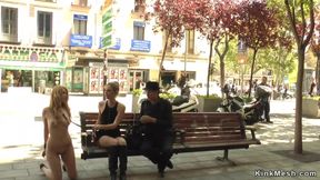 Naked blond hair girl kneeling in public streets