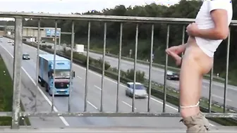 Outdoor Handjob for a Big-Cocked Hunk on a Highway Bridge