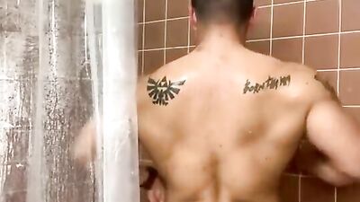 Horny Latino lad is touching himself while taking a shower