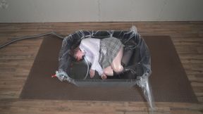 Sonya in a plastic cement bath vacuum packed