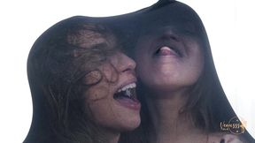 two blondes kissing encased in nylon!