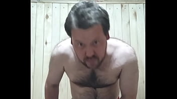A guy in a red thong is jerking off the smallest penis in the world!