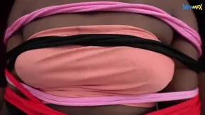 Hot Latina tied to chair in a BDSM setup.