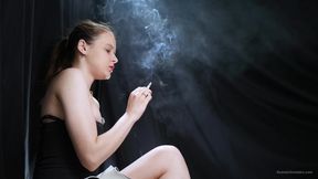 Topless Brunette Smoking in Dramatic Smoke