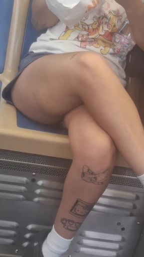 Tattooed Latina shows off her thick thighs in public