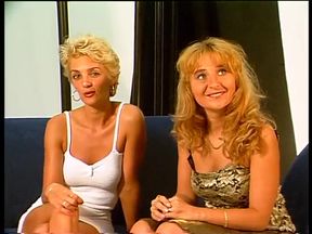 Two fabulous blonde chicks toy each other's wet pussy