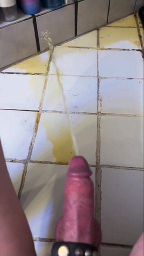 Memorable moment from &quot;Big Hard Cock Pissing on Floor Handsfree While Squatting 2&quot;