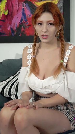 Redhead coed Keely Rose plays with a vibrator