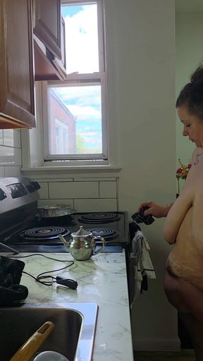 Nude housecleaning- washing dishes