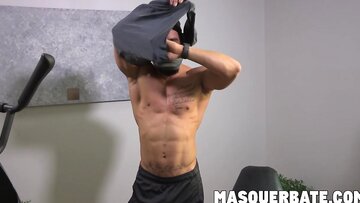 Muscular hunk with beard alone fapping inside the gym