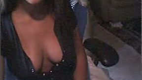 Charming ebony teenager gives a view of her natural boobs