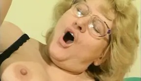 Glasses granny takes thick cock deep in ass