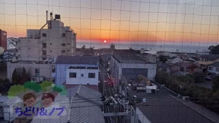 An amateur Japanese woman taking a leisurely bath at a hot spring inn with an open-air bath.
