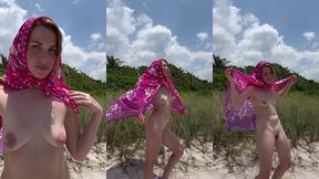 naked milf on a nudist beach shows off her small tits