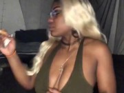 Smoking Milf teases with big tits