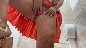 Horny stepmom masturbates and has orgasm in a public bathroom