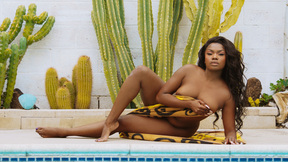 BBW black beauty Aziza exposes her big natural boobs by the pool outdoor