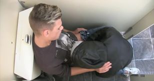 Toilet action featuring a couple of men with cute faces