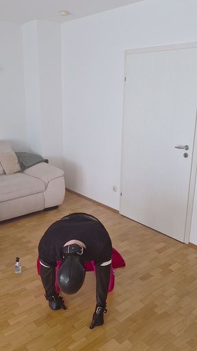 Bondage Slave rides a 22 cm dildo and deepthroats afterwards