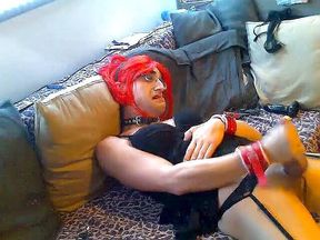 Colored hair crossdresser masturbating