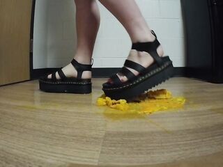 Crushing oranges in Platform Sandals
