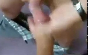 Two guys cum in one condom