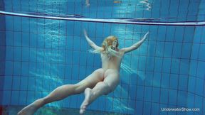 Russian blonde perfection swimming in the pool