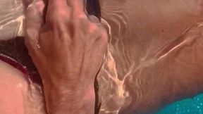 Blonde milf sizzles in sunlit pool &mdash;  fingers herself raw &mdash;  cumming wild under the heat