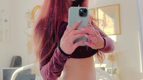 I love looking at myself in the mirror while playing with my pink pussy