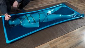 Blue vacuum bondage bed with rope and vibrator