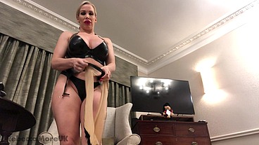 Rebecca More from Naked into a Sexy Latex Outfit Reverse Striptease