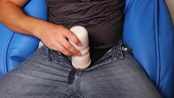 Solo masturbating using fleshlight with cumshot