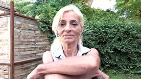 Skinny, toothless milf spreads her wet, pink pussy in public