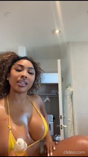 Big-titted babe shows off her boobs