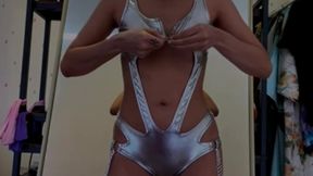 Naughty ebony girl with glasses tries on lingerie and toys