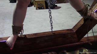 Busty redhead gets tied up with rope and teased