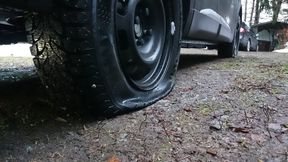 Two big tyres going down and FILA sneakers