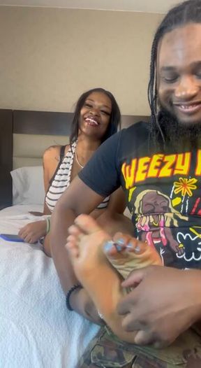 Tickling my feet in bedroom