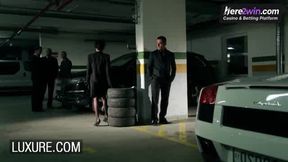 Brunette big titties gang-fuck in a parking garage