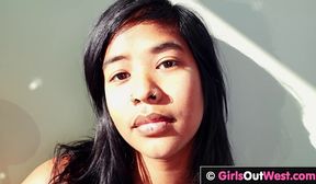 sweet exotic babe moans while fingering her hairy pussy