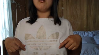 A Japanese woman drooling in a white T-shirt and masturbating with her nipples💓