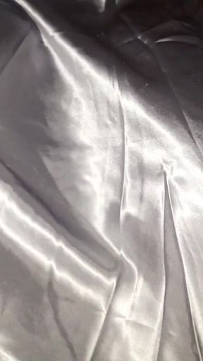 Masturbating wearing satin silver long dress in car   Clip 1