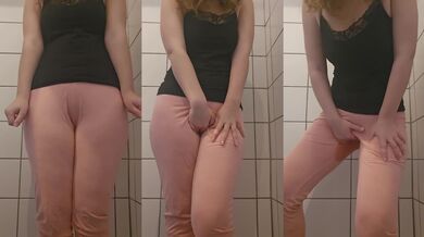 Desperately wetting pink pants until soaked