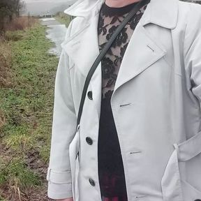 Crossdresser takes a walk on a windy lane